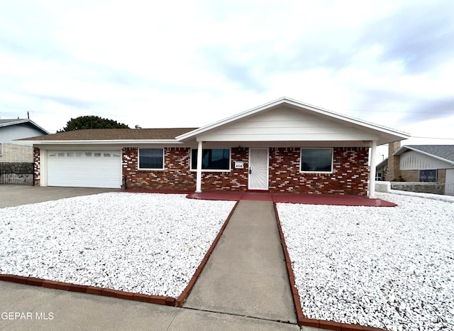 single story home featuring a garage