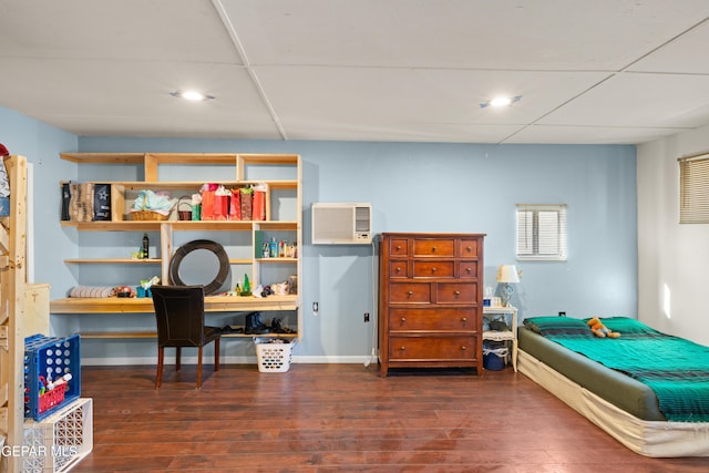 bedroom featuring dark hardwood / wood-style floors