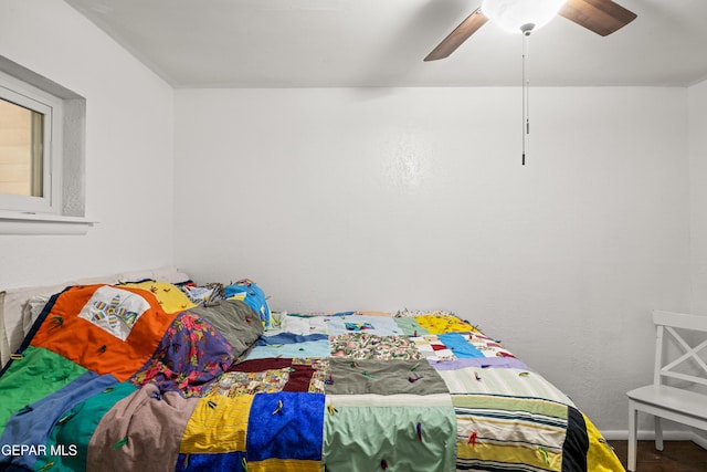 bedroom featuring ceiling fan