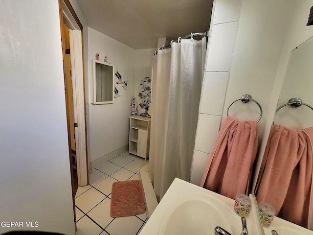 bathroom featuring a shower with curtain and tile patterned floors