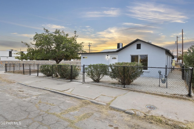 view of property exterior at dusk