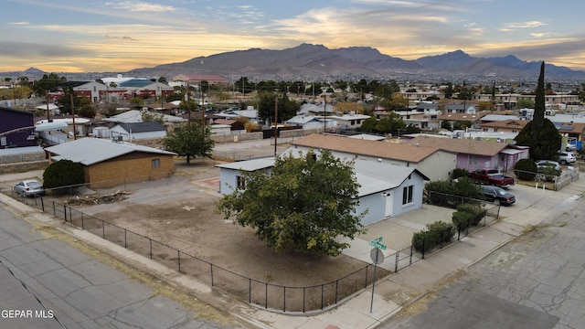 aerial view at dusk with a mountain view