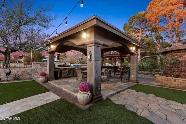 11179 Leo Collins Dr, El Paso, TX 79936 - view of property's community featuring area for grilling and a patio