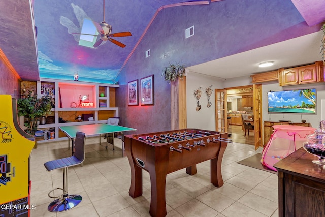 11179 Leo Collins Dr, El Paso, TX 79936 - recreation room featuring light tile patterned flooring, ceiling fan, and high vaulted ceiling