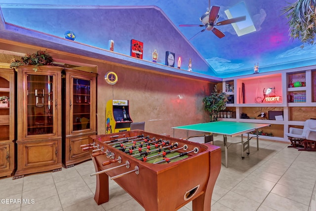 11179 Leo Collins Dr, El Paso, TX 79936 - game room featuring light tile patterned floors, ceiling fan, and high vaulted ceiling