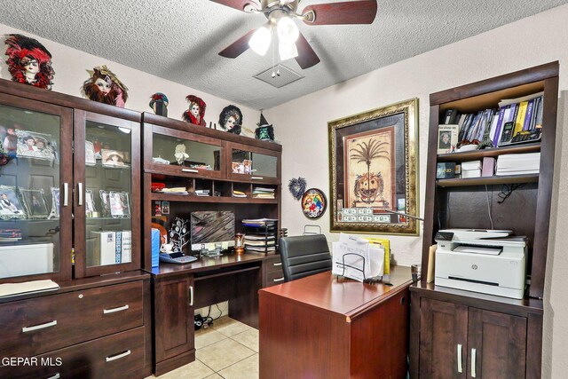 11179 Leo Collins Dr, El Paso, TX 79936 - office area featuring a ceiling fan, a textured ceiling, and light tile patterned flooring
