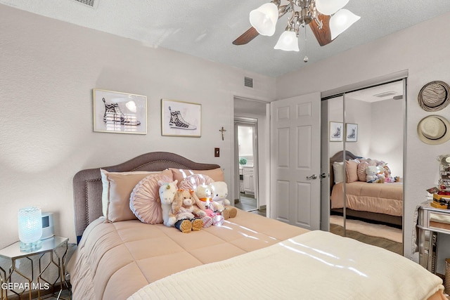 11179 Leo Collins Dr, El Paso, TX 79936 - bedroom featuring a closet and a ceiling fan