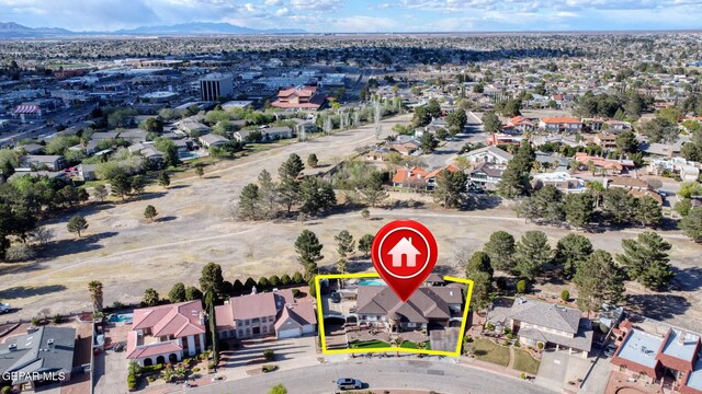 11179 Leo Collins Dr, El Paso, TX 79936 - aerial perspective of suburban area featuring property boundaries highlighted and a mountainous background