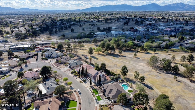 11179 Leo Collins Dr, El Paso, TX 79936 - aerial view of property's location featuring mountains and nearby suburban area