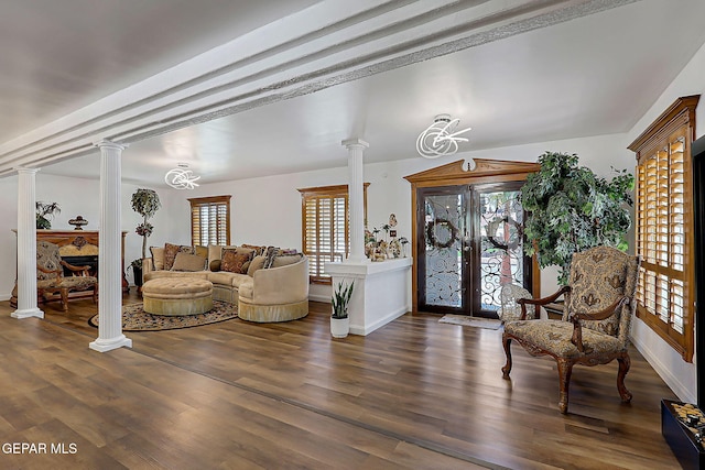 11179 Leo Collins Dr, El Paso, TX 79936 - living room featuring decorative columns, baseboards, wood finished floors, and french doors