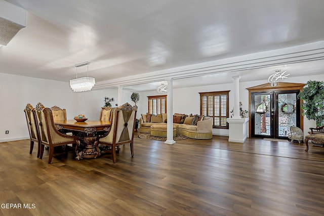 11179 Leo Collins Dr, El Paso, TX 79936 - dining room with dark wood-type flooring and ornate columns