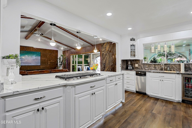 11179 Leo Collins Dr, El Paso, TX 79936 - kitchen with stainless steel gas cooktop, wine cooler, a sink, backsplash, and dark wood finished floors