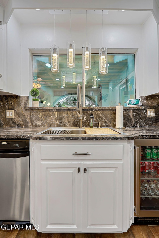 11179 Leo Collins Dr, El Paso, TX 79936 - kitchen with wine cooler, white cabinetry, decorative backsplash, and dark stone countertops