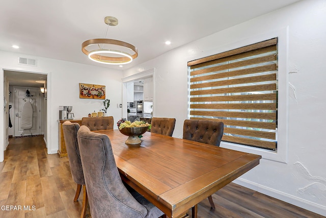 11179 Leo Collins Dr, El Paso, TX 79936 - dining area featuring wood finished floors, baseboards, and recessed lighting