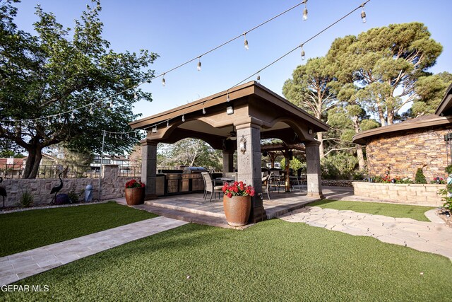 11179 Leo Collins Dr, El Paso, TX 79936 - view of yard with area for grilling, a patio area, and a gazebo