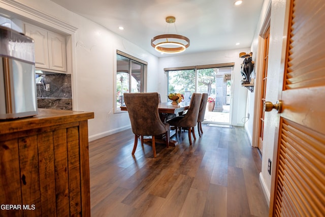 11179 Leo Collins Dr, El Paso, TX 79936 - dining room with dark wood-style floors, recessed lighting, and baseboards
