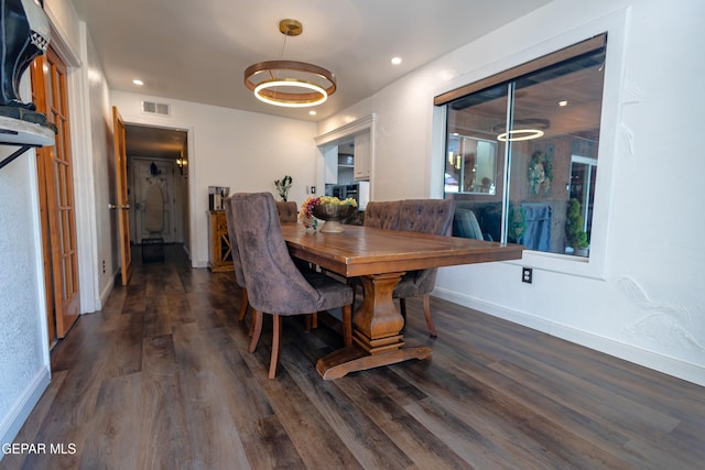 11179 Leo Collins Dr, El Paso, TX 79936 - dining area with wood finished floors, baseboards, and recessed lighting