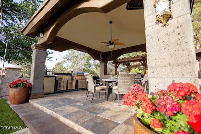 11179 Leo Collins Dr, El Paso, TX 79936 - view of patio featuring an outdoor kitchen, a ceiling fan, outdoor dining space, and grilling area