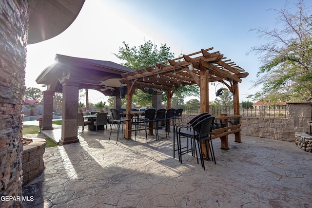 11179 Leo Collins Dr, El Paso, TX 79936 - view of patio / terrace featuring a pergola, a ceiling fan, fence, and outdoor dining space