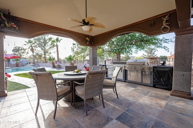 11179 Leo Collins Dr, El Paso, TX 79936 - view of patio featuring area for grilling, a grill, outdoor dining space, a fenced backyard, and a ceiling fan
