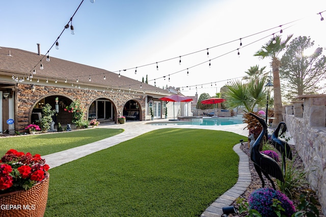 11179 Leo Collins Dr, El Paso, TX 79936 - view of green lawn featuring a patio area