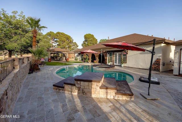 11179 Leo Collins Dr, El Paso, TX 79936 - swimming pool with a gazebo, an in-ground hot tub, a patio, and french doors
