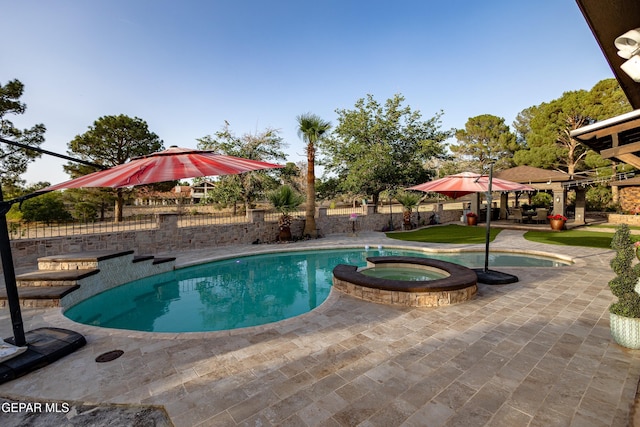 11179 Leo Collins Dr, El Paso, TX 79936 - view of pool featuring a patio area, a pool with connected hot tub, and a fenced backyard