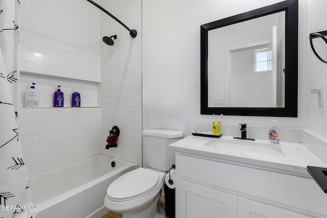 full bathroom featuring vanity, shower / bath combination with curtain, and toilet