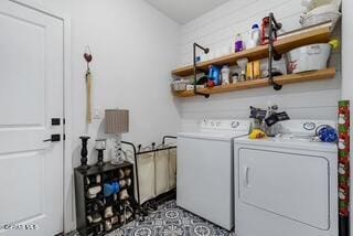 laundry room with separate washer and dryer