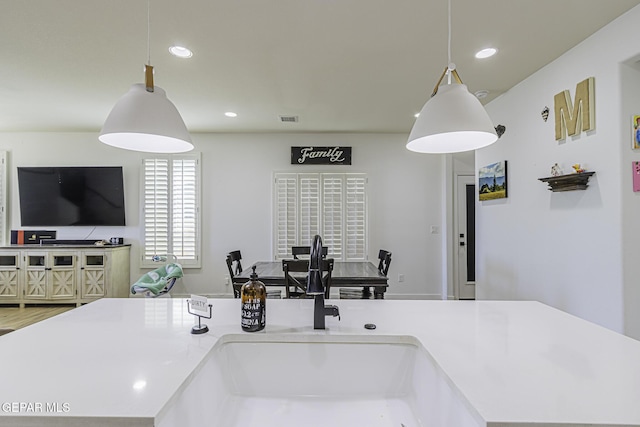 kitchen featuring decorative light fixtures