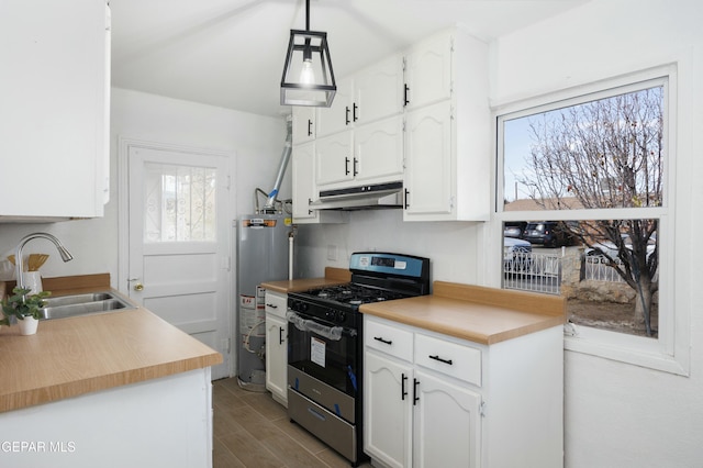 kitchen with white cabinetry, stainless steel gas stove, sink, gas water heater, and decorative light fixtures