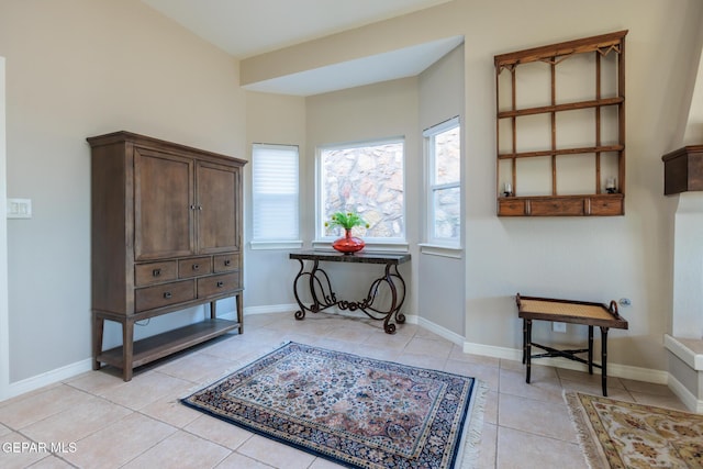 sitting room with light tile patterned flooring