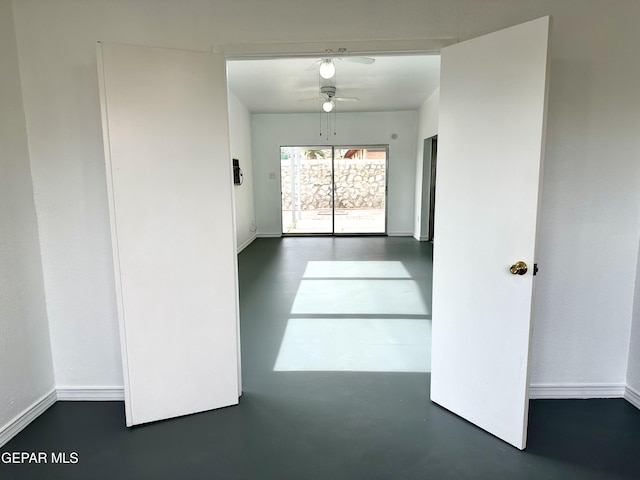 spare room with ceiling fan