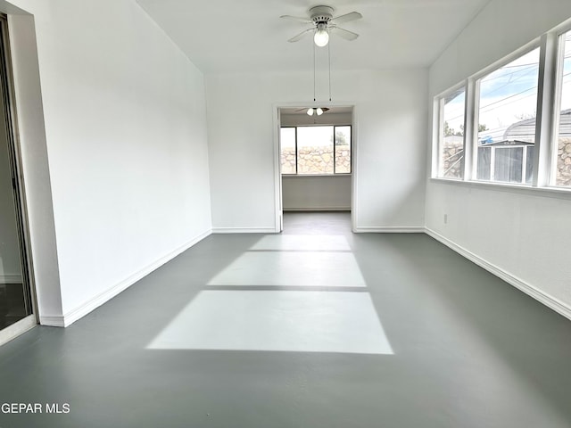 empty room featuring ceiling fan