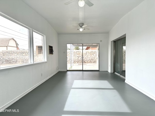 unfurnished room featuring ceiling fan