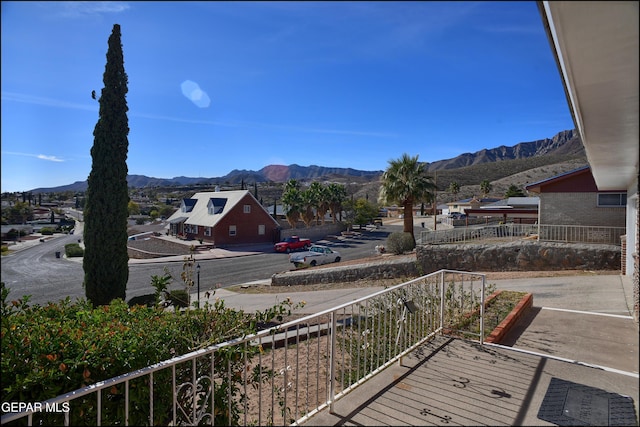 balcony featuring a mountain view