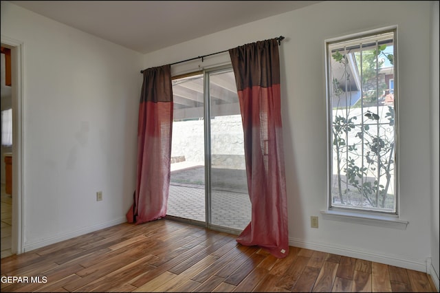 empty room featuring hardwood / wood-style floors