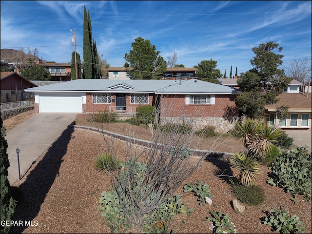 ranch-style home with a garage