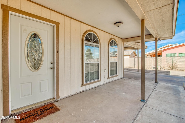 entrance to property with covered porch