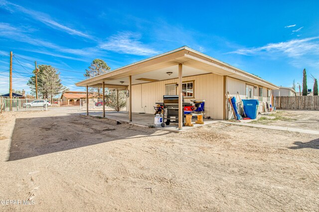 exterior space featuring a carport