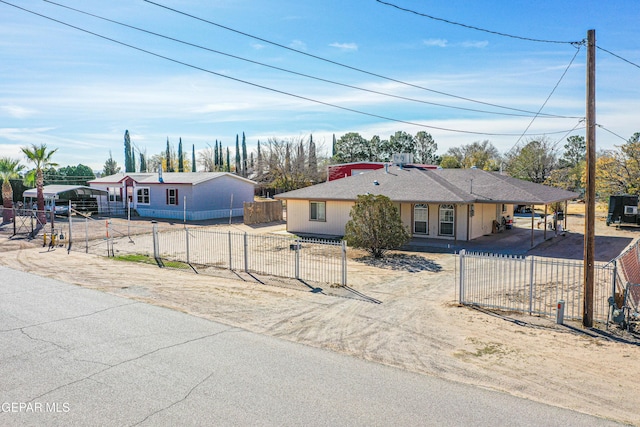 single story home featuring a carport