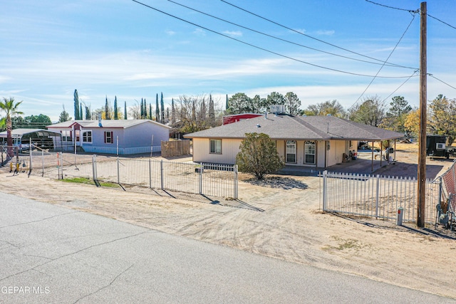 ranch-style house with a carport