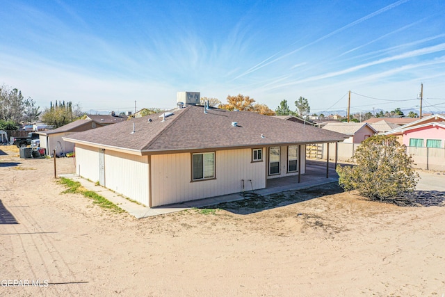 rear view of house with a patio