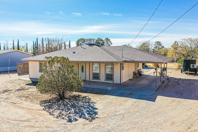 view of front of house featuring a carport