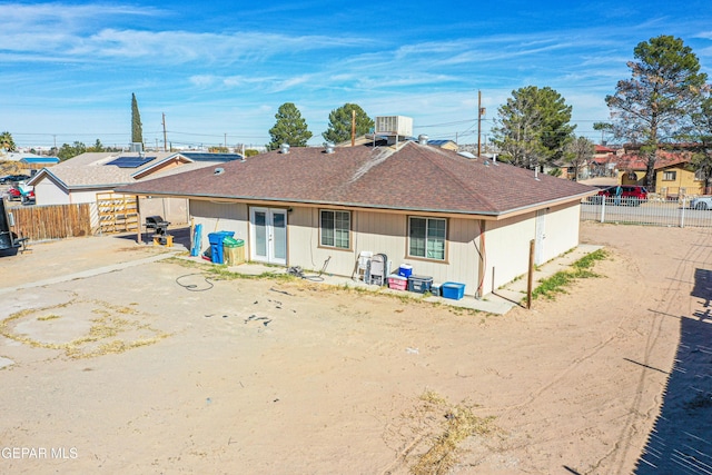 back of property with french doors and a patio