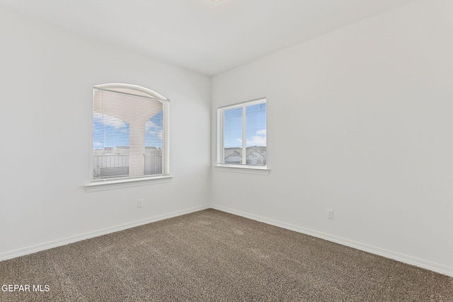 empty room featuring carpet