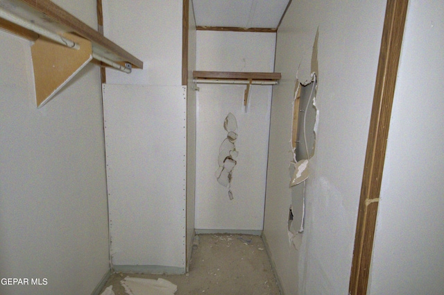 bathroom with concrete flooring