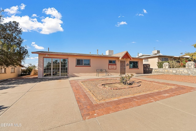 view of front of home featuring a patio area