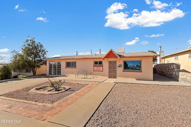 view of front of house featuring a patio