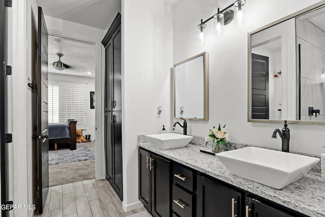 bathroom featuring vanity and wood-type flooring